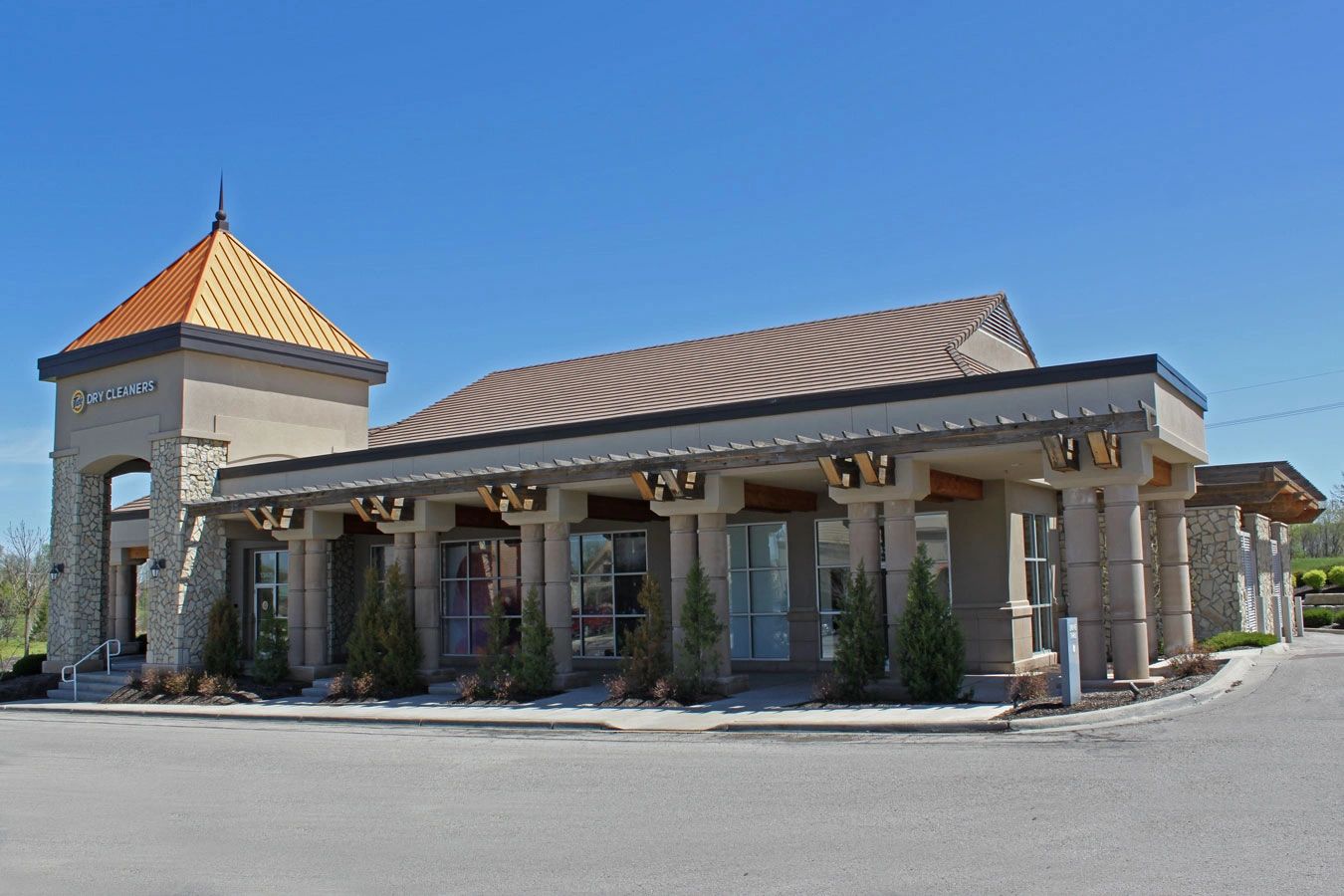 Stone columns with cast caps and sills on a finished building